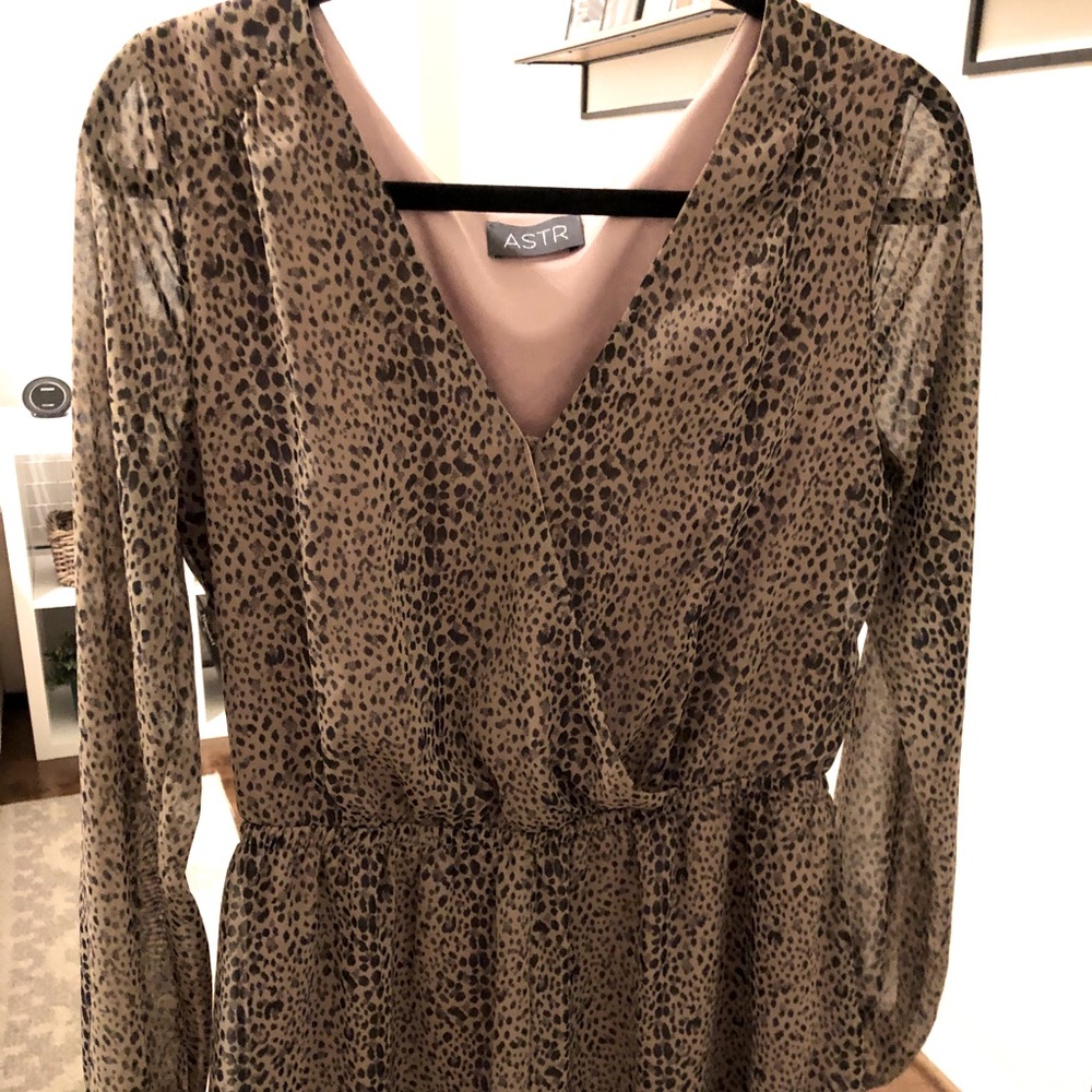Long Sleeved loose fit leopard jumper/romper